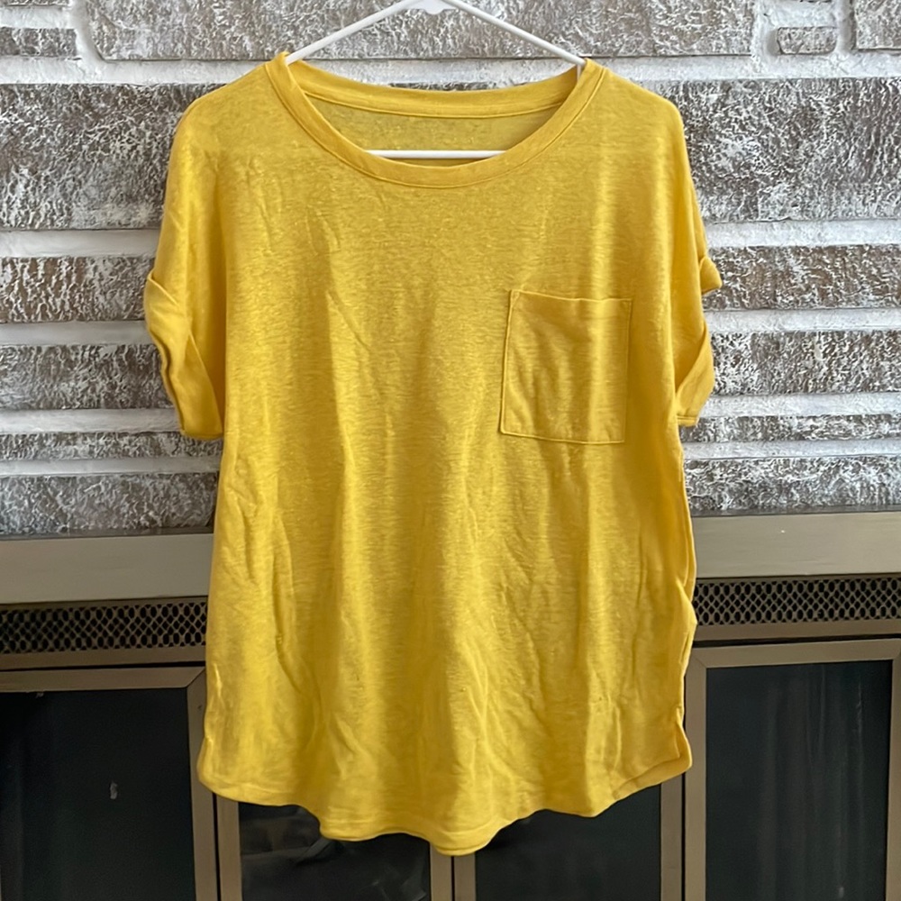 Yellow casual shirt.